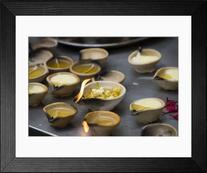 Framed Print : Singapore, Little India, Sri Veeramakaliamman Hindu Temple, votive candles
