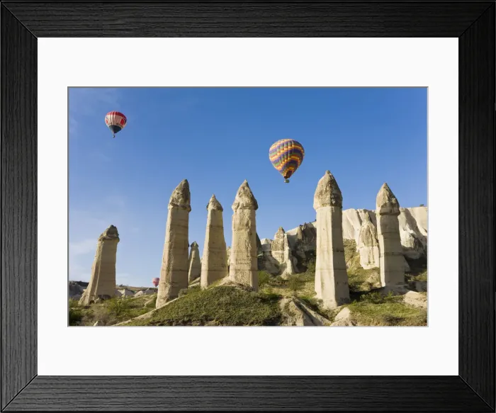 Framed Print : Hot Air Balloons over the Phallic pillars (Fairy Chimneys), Love Valley, near Goreme