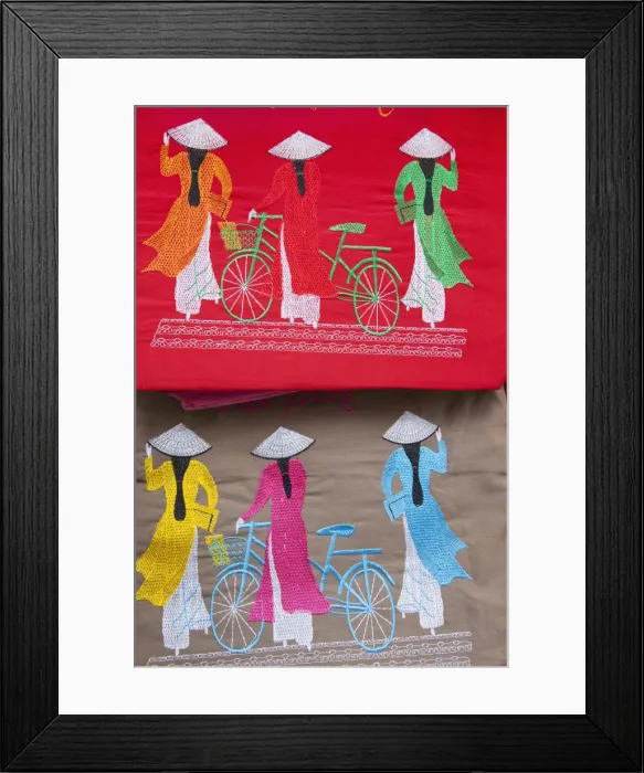 Framed Print : Vietnam, Hanoi, Needlework on Souvenir Handbag depicting Women in Traditional Ao-dai Framed Print : Vietnam, Hanoi, Needlework on Souvenir Handbag depicting Women in Traditional Ao-dai