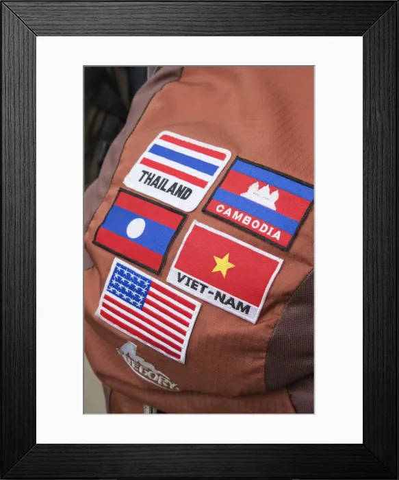 Framed Print : Vietnam, Hanoi, Backpack with Flags Framed Print : Vietnam, Hanoi, Backpack with Flags