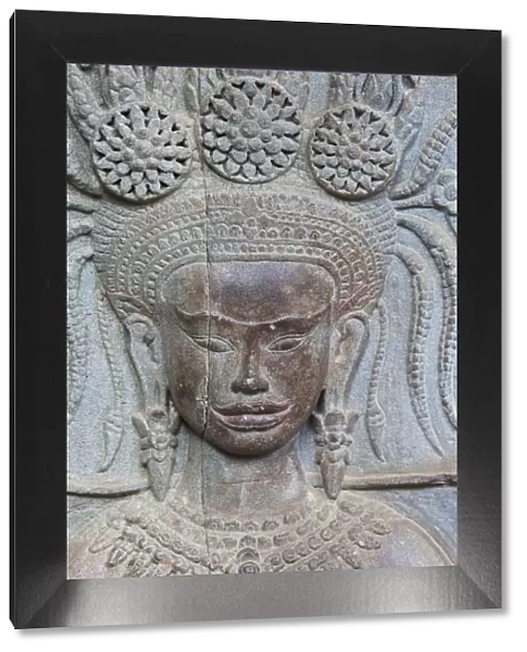 Cambodia, Siem Reap, Angkor Wat Temple, Carving Reliefs depicting Apsara Dancer