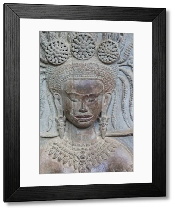 Framed Print : Cambodia, Siem Reap, Angkor Wat Temple, Carving Reliefs depicting Apsara Dancer Framed Print : Cambodia, Siem Reap, Angkor Wat Temple, Carving Reliefs depicting Apsara Dancer