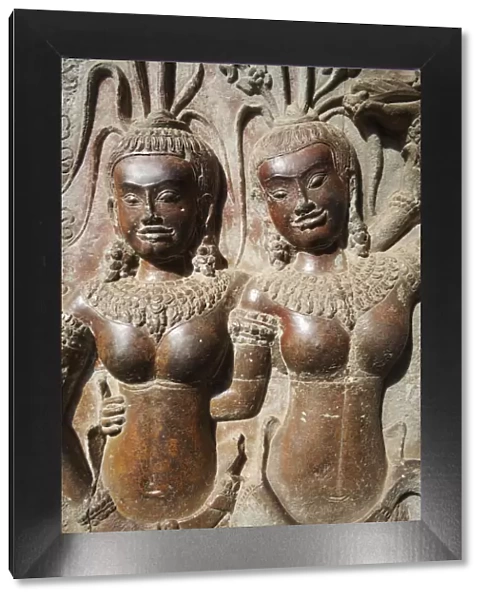 Cambodia, Siem Reap, Angkor Wat Temple, Carving Reliefs depicting Apsara Dancers
