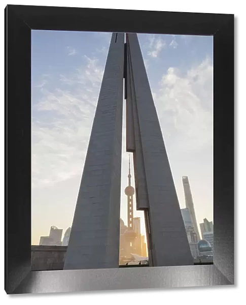 China, Shanghai, The Bund, Peoples Heroes Monument and Oriental Pearl Tower at