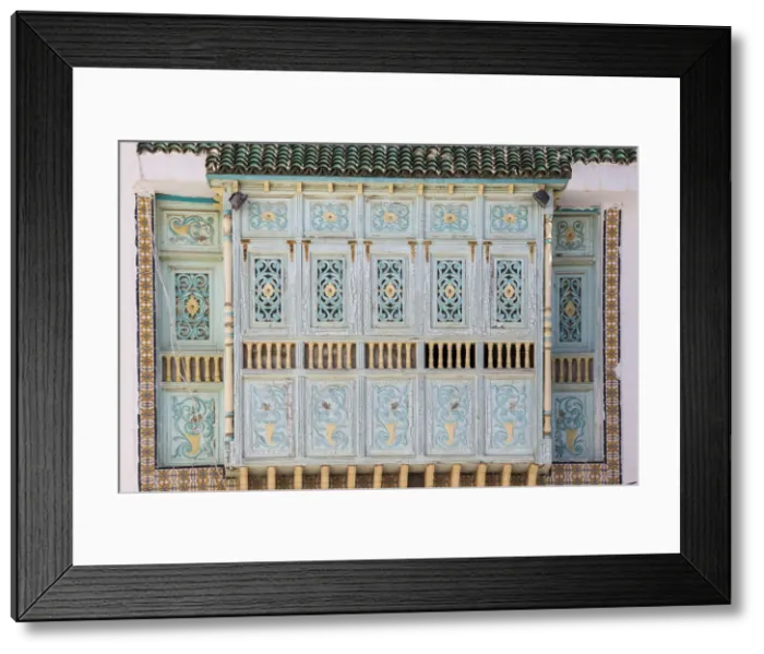 Framed Print : Tunisia, Kairouan, Decorative wooden window of house in the Madina