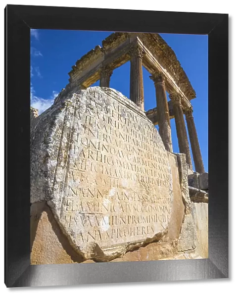 Tunisia, Teboursouk, Dougga archaeological site, Insribed stone infront of the The