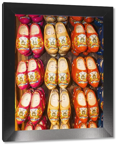 Europe, Netherlands, Amsterdam, Souvenir Shop Display of Colourful Wooden Clogs