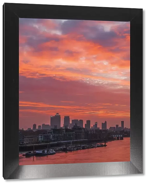 England, London, Sunrise over Canary Wharf and Docklands