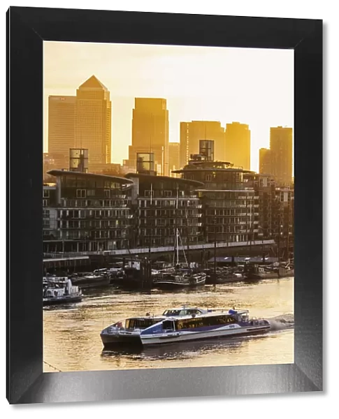 England, London, Sunrise over Canary Wharf and Docklands