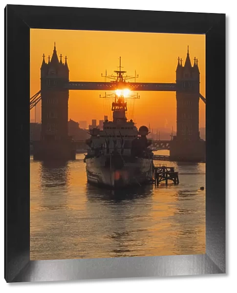 England, London, Tower Bridge and Museum Ship HMS Belfast at Sunrise