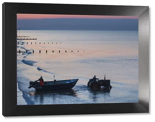 England, West Sussex, Bognor Regis, Fishermen Departing at Dawn