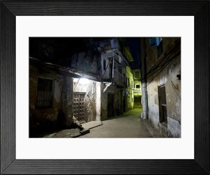 Framed Print : Night time Street scene in Stone Town, Unguja Island, Zanzibar archipelago, Tanzania Framed Print : Night time Street scene in Stone Town, Unguja Island, Zanzibar archipelago, Tanzania