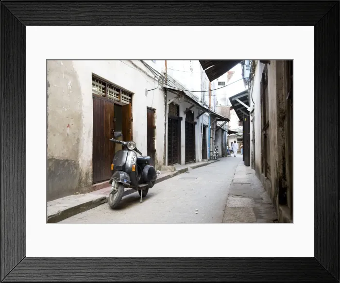 Framed Print : Street scene in Stone Town with moped, Unguja Island, Zanzibar archipelago, Tanzania