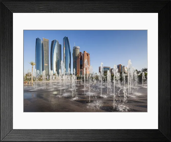 Framed Print : UAE, Abu Dhabi, Etihad Towers and Emirates Palace Hotel fountains, dusk Framed Print : UAE, Abu Dhabi, Etihad Towers and Emirates Palace Hotel fountains, dusk