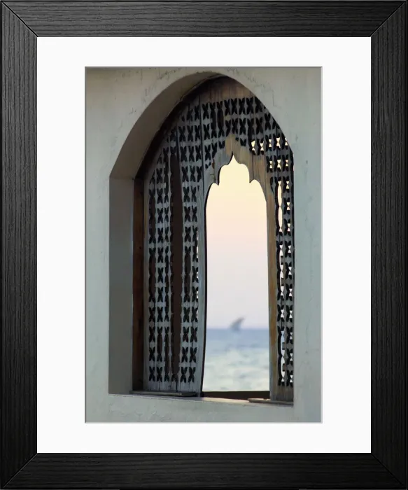 Framed Print : Tanzania. Zanzibar, Stone Town, Old Town, Dhow (traditional sailboat) sailing at sunset Framed Print : Tanzania. Zanzibar, Stone Town, Old Town, Dhow (traditional sailboat) sailing at sunset
