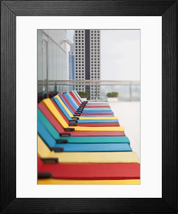 Framed Print : UAE, Dubai, colourful hotel loungers Framed Print : UAE, Dubai, colourful hotel loungers