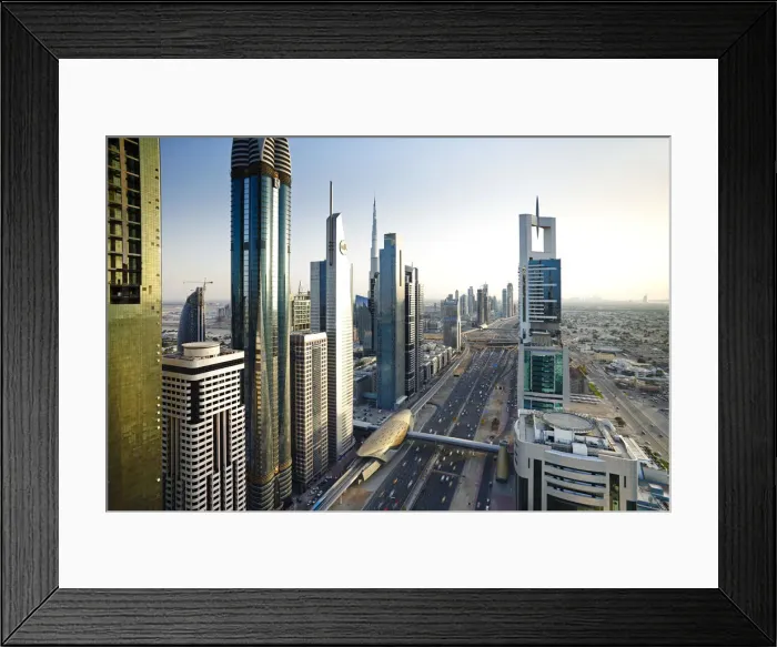 Framed Print : Elevated view over the modern Skyscrapers along Sheikh Zayed Road looking towards Framed Print : Elevated view over the modern Skyscrapers along Sheikh Zayed Road looking towards