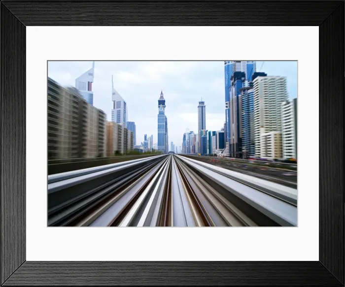 Framed Print : Opened in 2010, the Dubai Metro, MRT, in motion along Sheikh Zayed Road at dusk, Dubai Framed Print : Opened in 2010, the Dubai Metro, MRT, in motion along Sheikh Zayed Road at dusk, Dubai