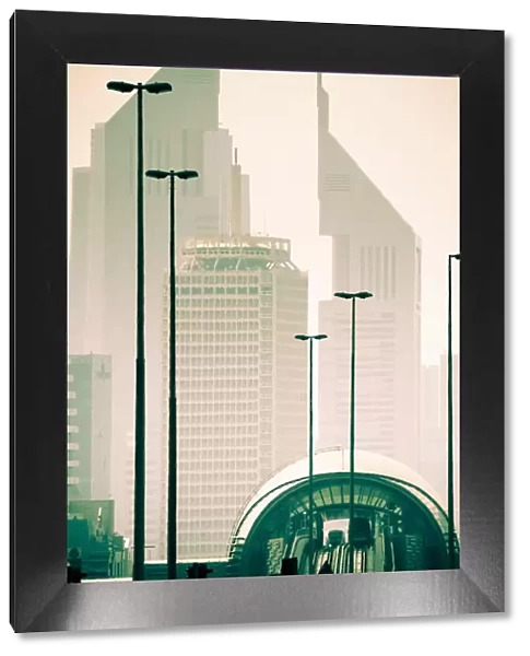 UAE, Dubai, Trade Centre Road, Emirates Towers with Al Karama Metro Station in foreground