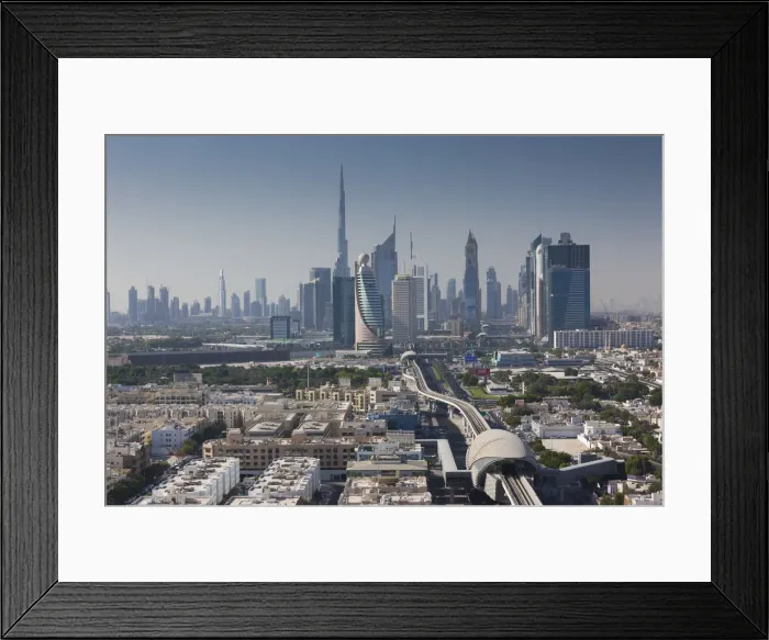Framed Print : UAE, Dubai, Downtown Dubai skyline above metro rail Framed Print : UAE, Dubai, Downtown Dubai skyline above metro rail
