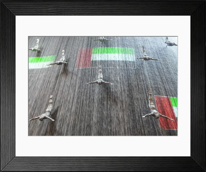 Framed Print : The Dubai Mall, Diving men sculpture & projected UAE flag, diving art statues Framed Print : The Dubai Mall, Diving men sculpture & projected UAE flag, diving art statues