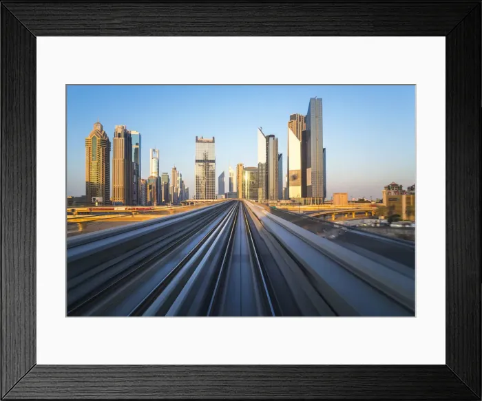 Framed Print : POV on the modern driverless Dubai elevated Rail Metro System, running alongside Framed Print : POV on the modern driverless Dubai elevated Rail Metro System, running alongside