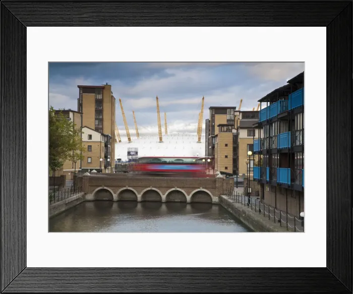 Framed Print : Endland, London, Canary Wharf, Bus going over bridge with O2 Arena in background
