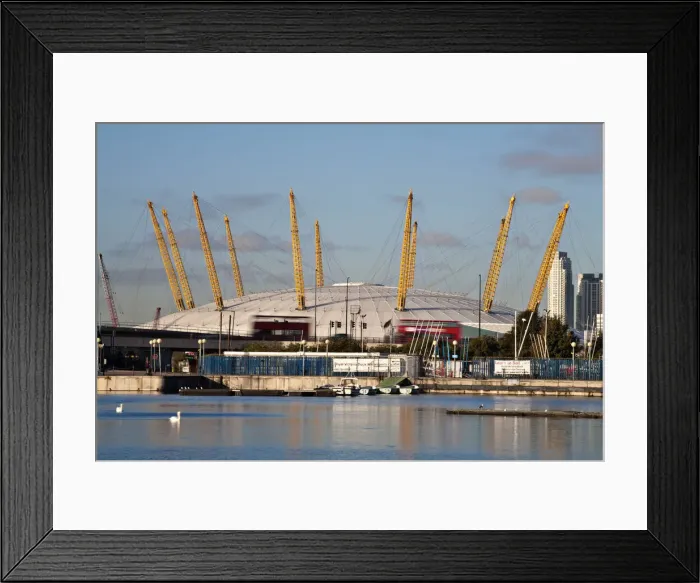 Framed Print : England, London, Newham, Royal Victoria Docks, Red double decker buses passing infront
