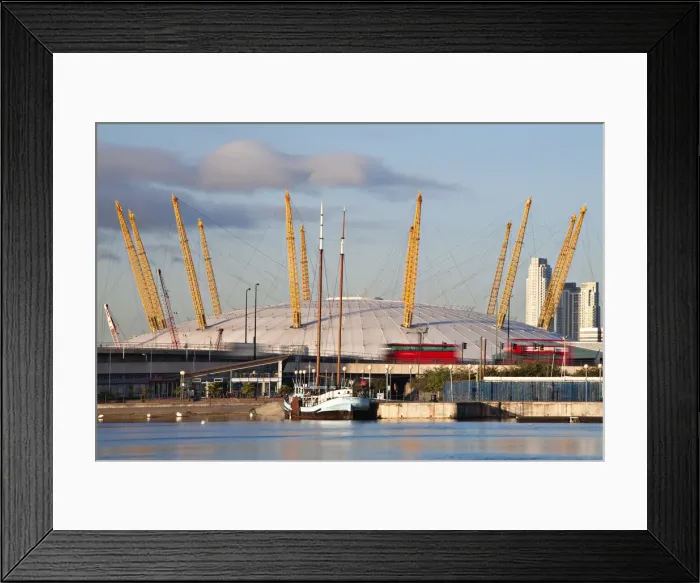 Framed Print : England, London, Newham, Royal Victoria Docks, Red double decker buses passing infront Framed Print : England, London, Newham, Royal Victoria Docks, Red double decker buses passing infront