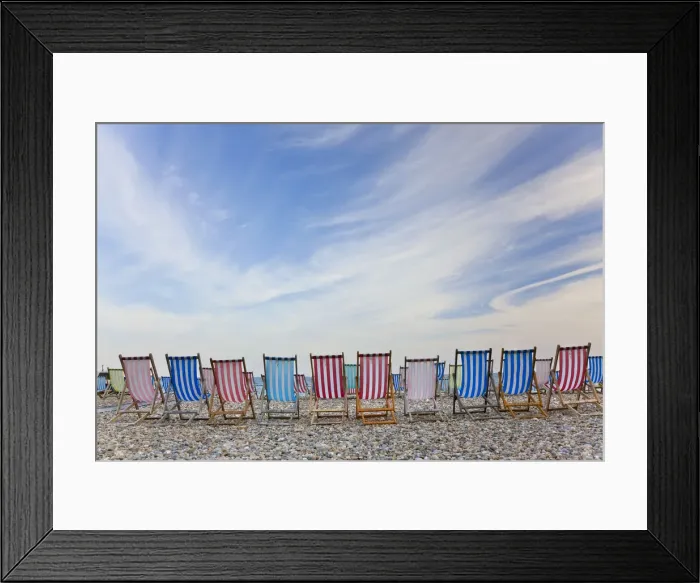 Framed Print : Deckchairs on pebble beach, Sidmouth, Devon, UK Framed Print : Deckchairs on pebble beach, Sidmouth, Devon, UK