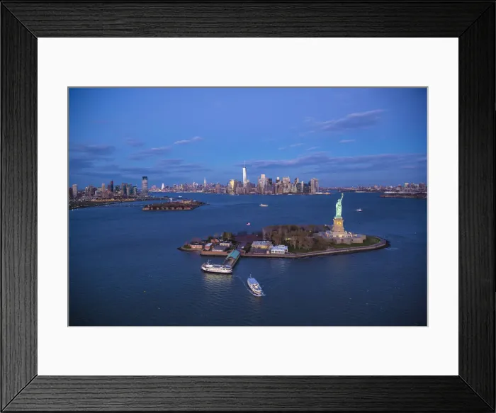 Framed Print : Aerial view over the Statue of Liberty, Manhattan, New York City, USA Framed Print : Aerial view over the Statue of Liberty, Manhattan, New York City, USA
