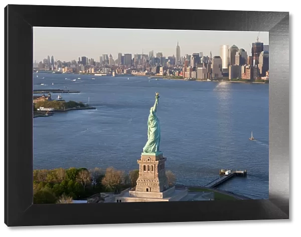 Statue of Liberty (Hudson River, Ellis Island and Manhattan behind), New York, USA