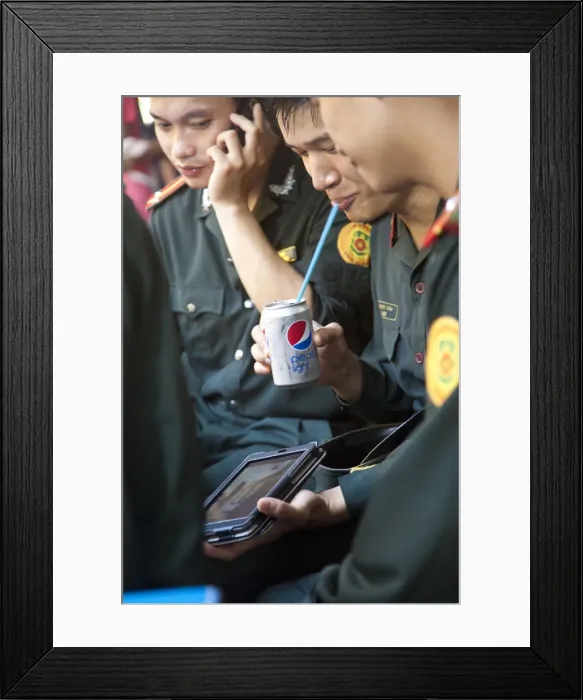 Framed Print : Vietnamese Soldiers enjoying modern Western products, Hanoi, Vietnam Framed Print : Vietnamese Soldiers enjoying modern Western products, Hanoi, Vietnam