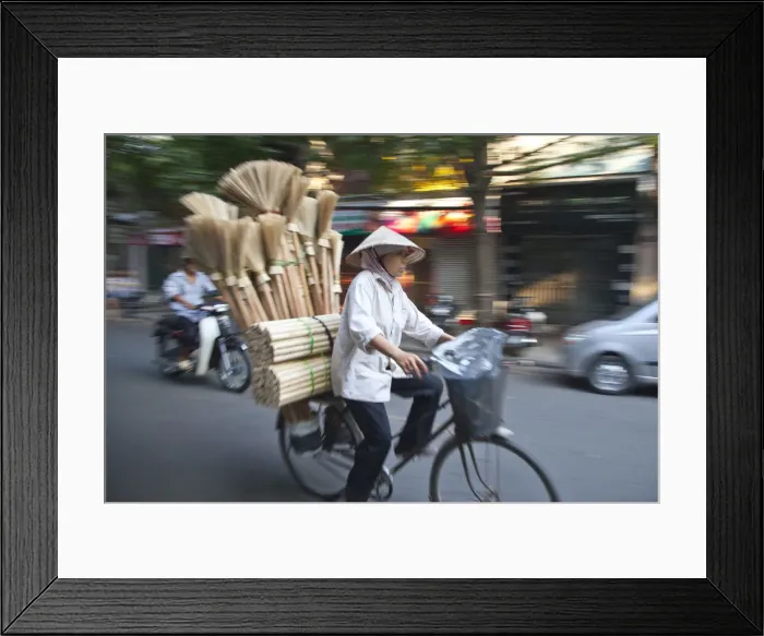 Framed Print : Woman carrying brooms on her bike, Old Quarter, Hanoi, Vietnam Framed Print : Woman carrying brooms on her bike, Old Quarter, Hanoi, Vietnam