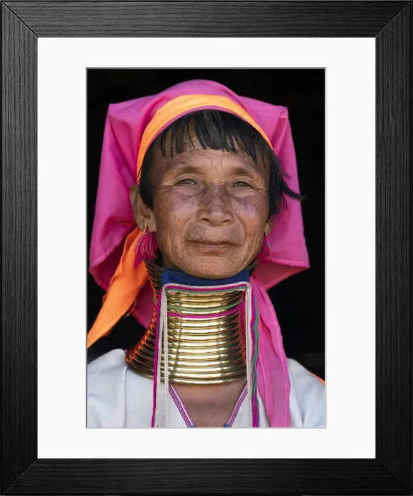 Framed Print : Close-up portrait of senior Kayan woman wearing traditional brass neck rings Framed Print : Close-up portrait of senior Kayan woman wearing traditional brass neck rings