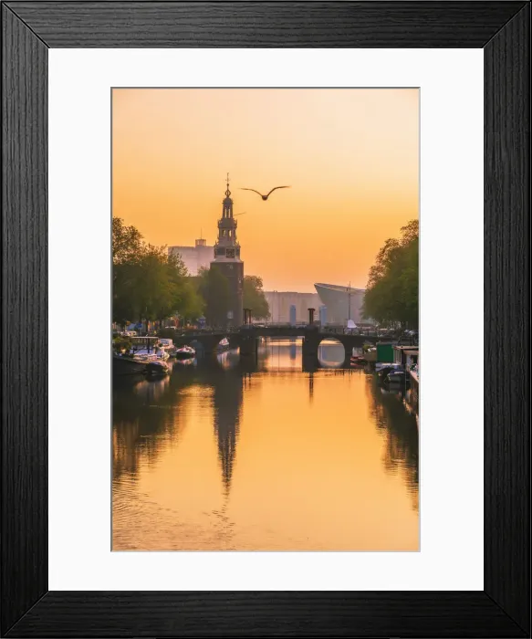 Framed Print : View of the NEMO science museum by Renzo Piano and Montelbaanstoren in Amsterdam Framed Print : View of the NEMO science museum by Renzo Piano and Montelbaanstoren in Amsterdam