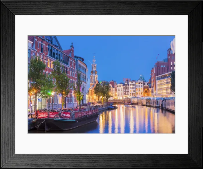 Framed Print : Munttoren tower reflecting in the water canal by night in Amsterdam, Holland / Netherlands Framed Print : Munttoren tower reflecting in the water canal by night in Amsterdam, Holland / Netherlands