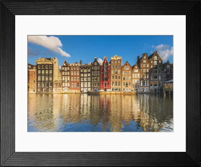 Framed Print : Typical houses reflecting in Damrak canal at sunset, Holland / Netherlands Framed Print : Typical houses reflecting in Damrak canal at sunset, Holland / Netherlands