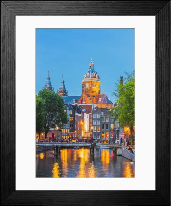 Framed Print : St. Nicholas church reflecting in the water canal by night in Amsterdam Framed Print : St. Nicholas church reflecting in the water canal by night in Amsterdam