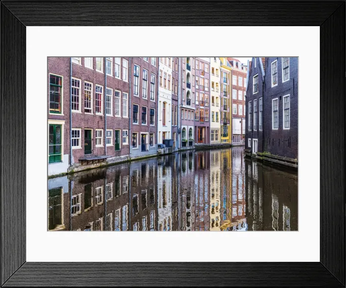Framed Print : Traditional buildings reflected in the canal, Amsterdam, the Netherlands Framed Print : Traditional buildings reflected in the canal, Amsterdam, the Netherlands