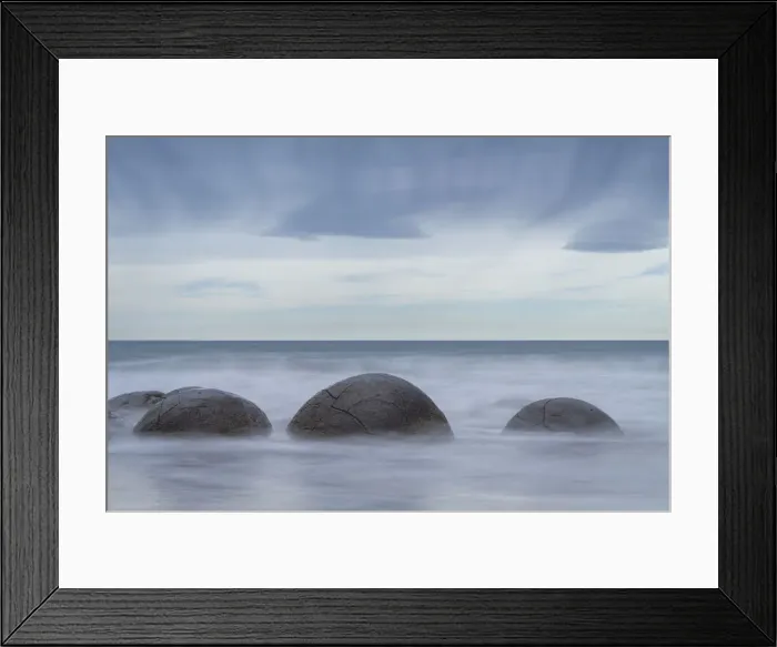 Framed Print : Popular Moeraki Boulders in sea against sky, Hampden, North Otago, South Island Framed Print : Popular Moeraki Boulders in sea against sky, Hampden, North Otago, South Island