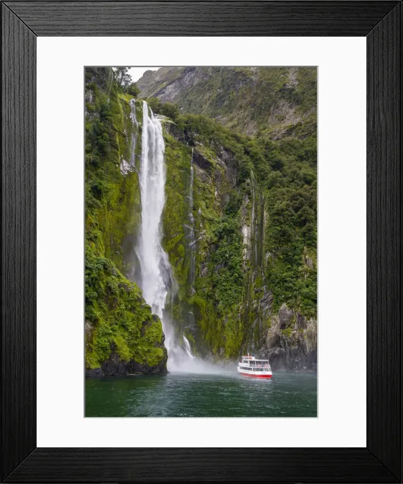 Framed Print : Tourist boat approaching Stirling Falls in Milford Sound in Fiordland National Park Framed Print : Tourist boat approaching Stirling Falls in Milford Sound in Fiordland National Park