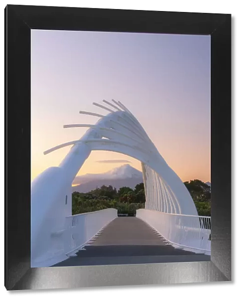 View of the Taranaki volcano in New Zealand through a modern bridge in New Plymouth at
