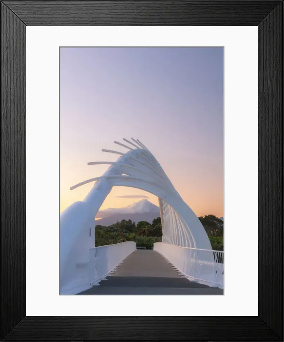 Framed Print : View of the Taranaki volcano in New Zealand through a modern bridge in New Plymouth Framed Print : View of the Taranaki volcano in New Zealand through a modern bridge in New Plymouth