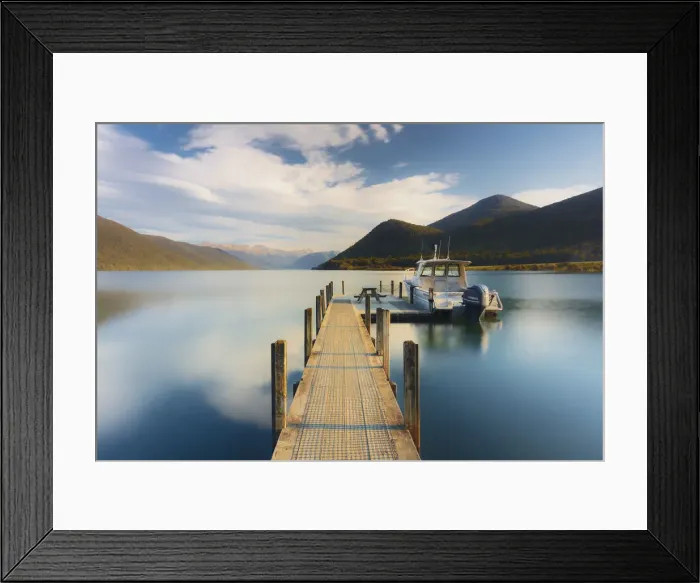 Framed Print : A little boat and a jetty in the Rotoroa lake, part of the Nelson lakes in New Zealand Framed Print : A little boat and a jetty in the Rotoroa lake, part of the Nelson lakes in New Zealand