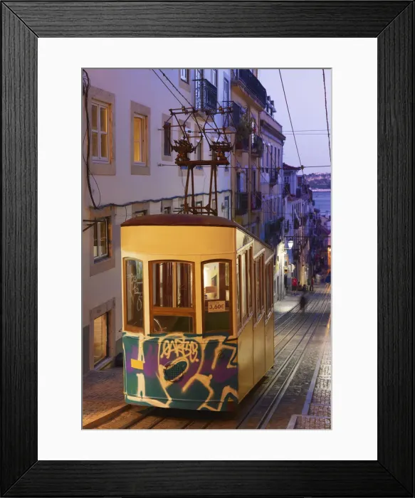 Framed Print : Portugal, Lisbon, Alfama district, Tram at dusk Framed Print : Portugal, Lisbon, Alfama district, Tram at dusk