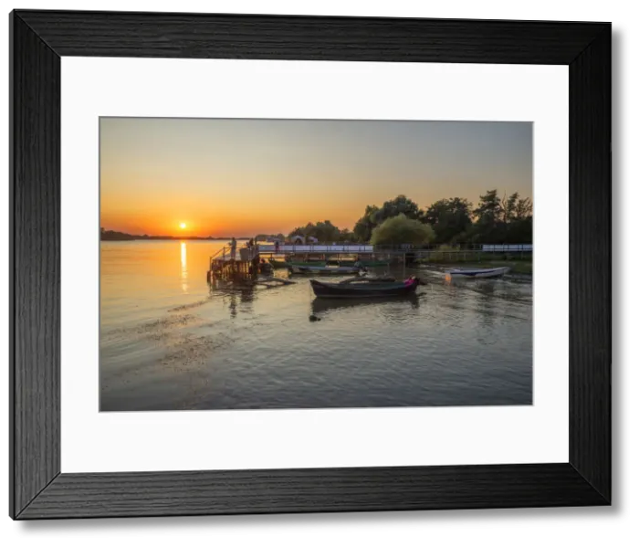 Framed Print : Pier with boats and fishermen at the Saint George branch of the Danube, Saint George Framed Print : Pier with boats and fishermen at the Saint George branch of the Danube, Saint George
