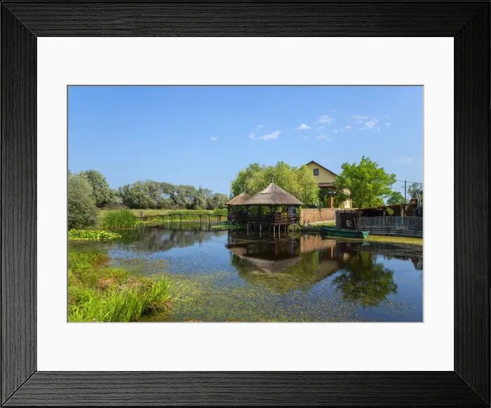 Framed Print : Canal at the village of Saint George, Danube Delta, Dobradschda, Romania Framed Print : Canal at the village of Saint George, Danube Delta, Dobradschda, Romania