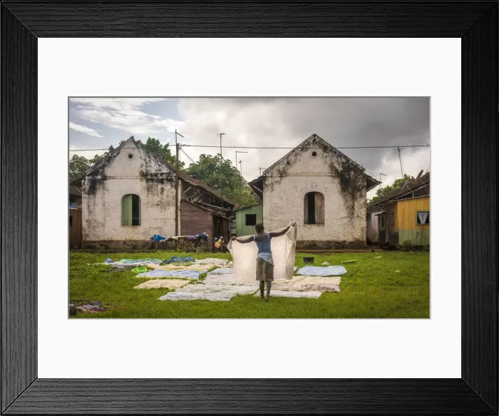 Framed Print : Africa, SA£o Toma and Principe. The workers houses of Roca Sundy with a woman Framed Print : Africa, SA£o Toma and Principe. The workers houses of Roca Sundy with a woman