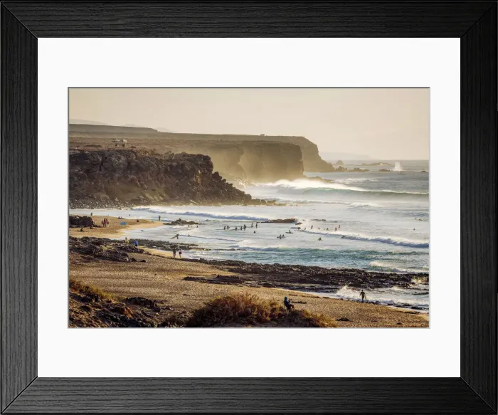 Framed Print : Surfers in El Cotillo coastline, Fuerteventura, Canary Islands. Spain Framed Print : Surfers in El Cotillo coastline, Fuerteventura, Canary Islands. Spain